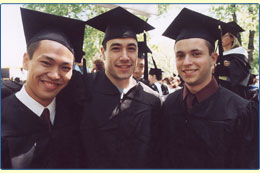 three guys in cap & gown